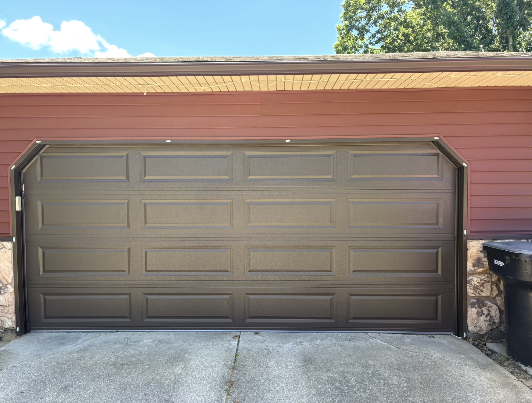 New brown garage door installed on a Michiana home